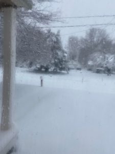 Major snowstorm kicks off 2022 24 a snow covered street