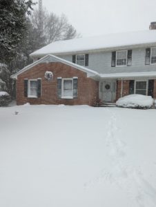 Major snowstorm kicks off 2022 20 a house covered in snow