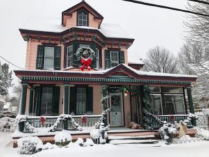 Major snowstorm kicks off 2022 13 a house covered in snow in front of a building