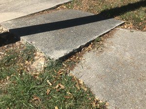 Featured image for “Sidewalk repair and replacement bid awarded”