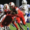 Smyrna football Kahmaj Kearney runs the ball against Dover photo courtesy of Donnell Henriquez