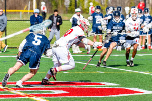 Photo Gallery: Smyrna vs Friends Boys Lacrosse 2 Smyrna's faceoff specialist junior Elijah Mann (40) wins the faceoff against Wilmington Friends sophomore Kyle Sullivan (5)