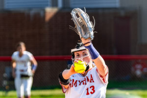 Smyrna senior Lindsey Roscoe gets ready to fire in her pitch as the Eagles take on the Milford Buccaneers.
