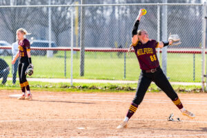 Senior Briella Salisbury getting in a few practice pitches before facing the Smyrna Eagles. 