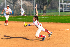 Freshman Lily Dixon makes an immaculate catch, extending all the way to make the grab.