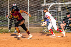 Fountain takes off running after seeing the ball go past the Smyrna fielder.