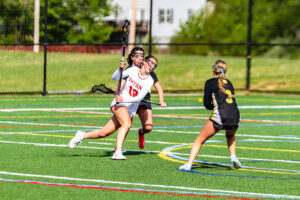 A Smyrna attacker bends around the Padua defense to set up the Smyrna offense.
