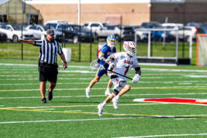Eagle senior Tannin Bell streaks down the field with the ball in hand.