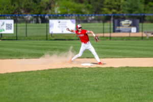 The Smyrna shortstop gets ready to throw to the first after fielding a ground ball.