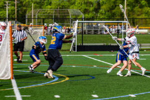 McCray defends another shot from the Smyrna offense which scored a season high 22 goals.