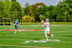 Smyrna senior Braeden Marshall throws a pass to a teammate.