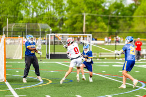 Drew Marks makes a leaping attempt at a goal for Smyrna.