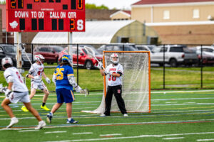 Smyrna goalkeeper Colin McGowan looks for a teammate to pass too after making a save.