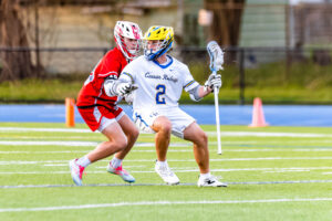 Caesar Rodney senior Ian Klauder tries to get around the Smyrna defender.