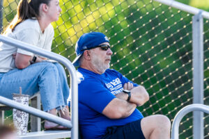 Fans in the stands looking at the action on the diamond.