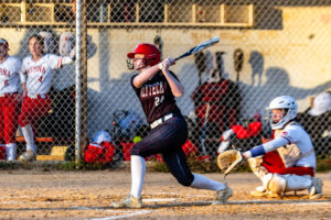Gabrielle Bogdon follows through on one of her three hits in the game.