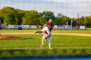 Smyrna celebrates their 8-6 victory Thursday night.