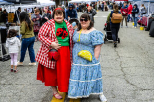 Janice Jester (left) and Lizzy Davis (right) attend the festival in summer inspired outfits.
