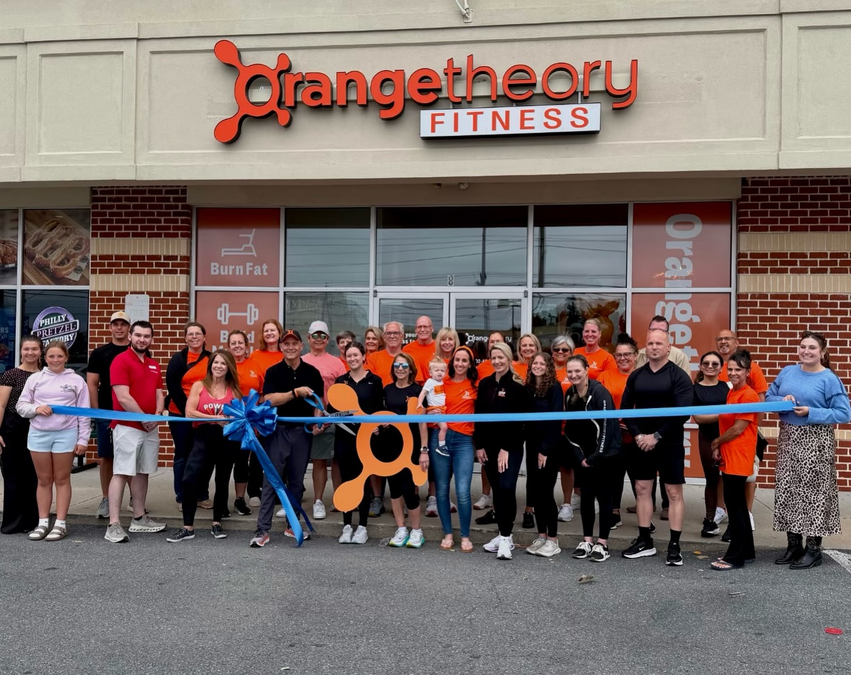 Orangetheory Fitness Rehoboth Beach celebrated a ribbon cutting on May 22, officially opening its locally owned studio at 18701 Coastal Highway. (Photo courtesy of Orangetheory Fitness Rehoboth Beach.)