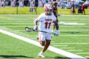 Smyrna senior Braeden Marshall runs down the field with the ball.