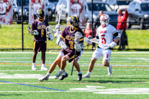Milford senior Ty Mackert tries to navigate against the Eagle defense.
