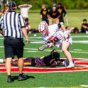 The Smyrna face-off man wins the battle and gains possession for the Eagles.